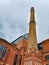 Chimney of renovated brick building in ÅÃ³dÅº City at cloudy day